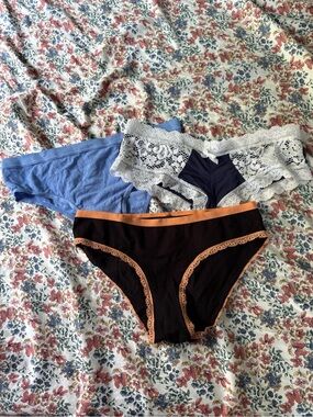 Set of Three Women's Bikini Briefs in Black, Blue, and Navy with White Lace